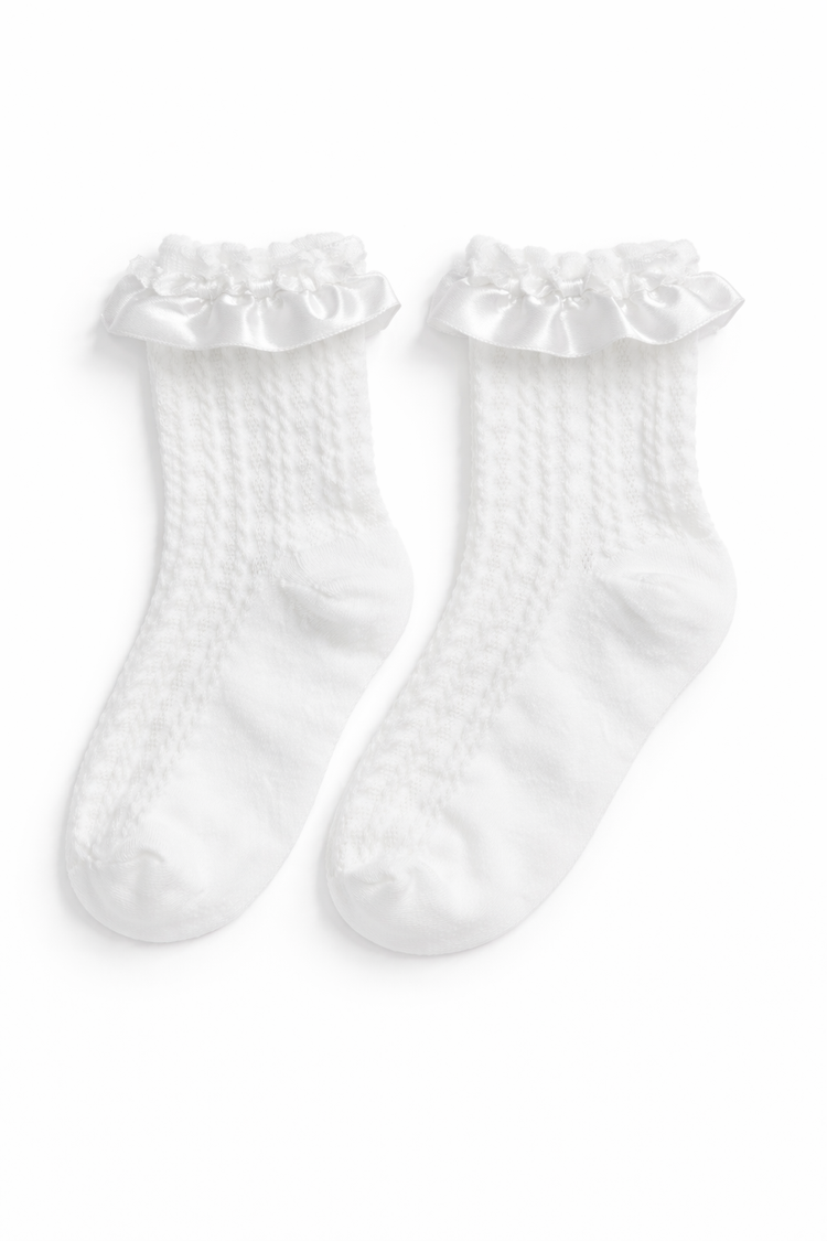 The Innocent Mischief Lace Socks in white with satin ruffle.