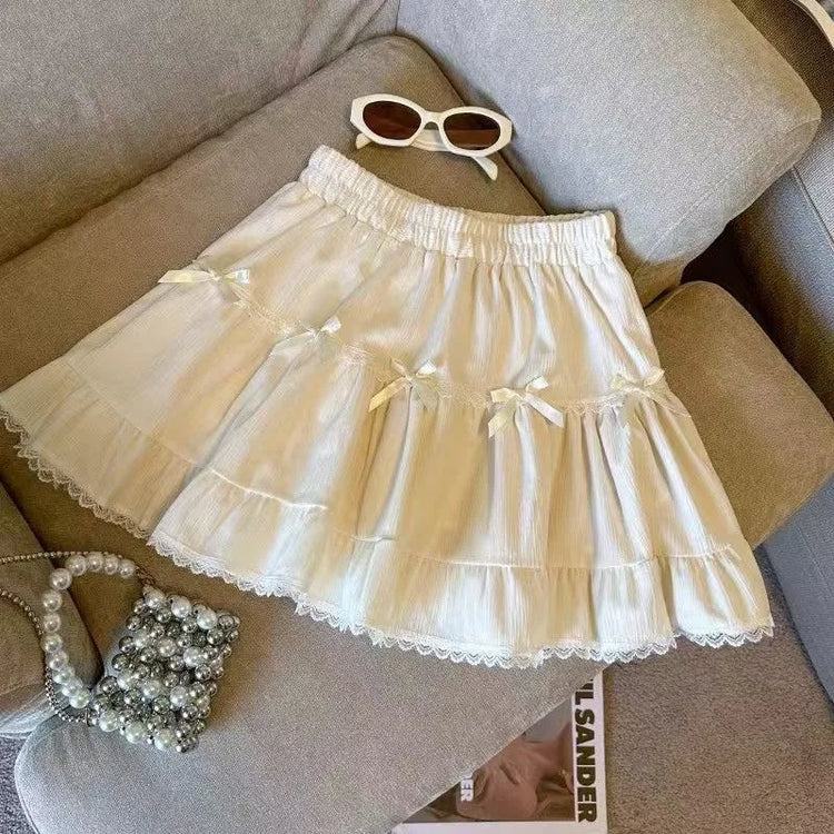 Flat lay of the Bow Peep Mini Skort in Apricot.