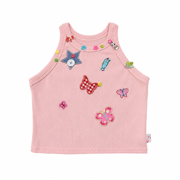 Dusty pink Charm Collector Tank shown in a front flat lay with colorful butterfly, star, animal, and button embellishments.
