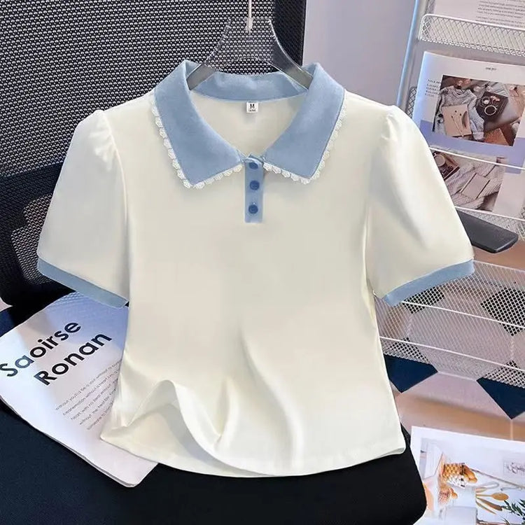 Front view of the Collar Me Cute Polo Top in white with blue collar