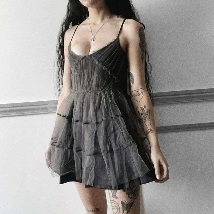 Model wearing Dark Fairy Tulle Dress three-quarter view highlighting soft layered tulle skirt