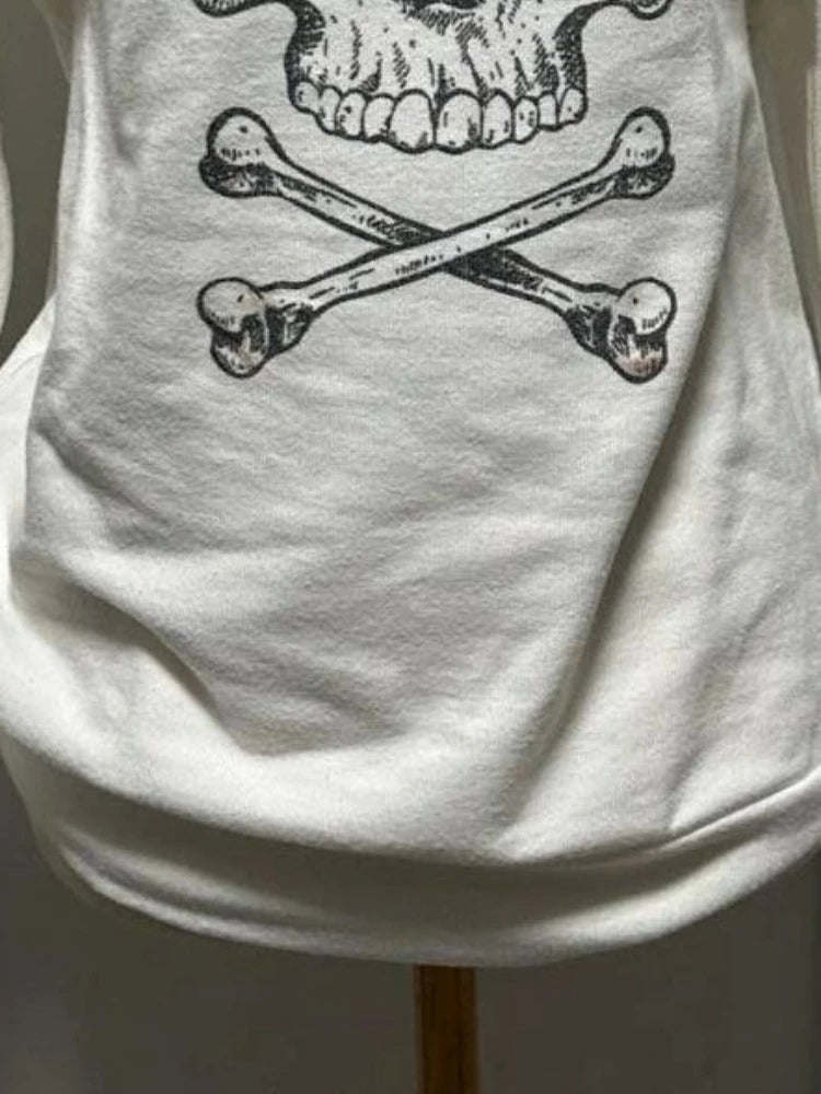 Bottom half front view of Dead Cute Off-Shoulder Top showing oversized fit and lower half of grunge skull print