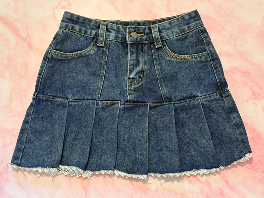 Front view of the Denim Daydream Pleated Lace Skort laid flat