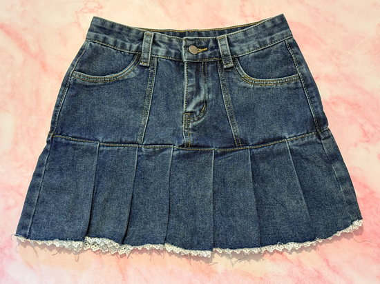 Front view of the Denim Daydream Pleated Lace Skort laid flat