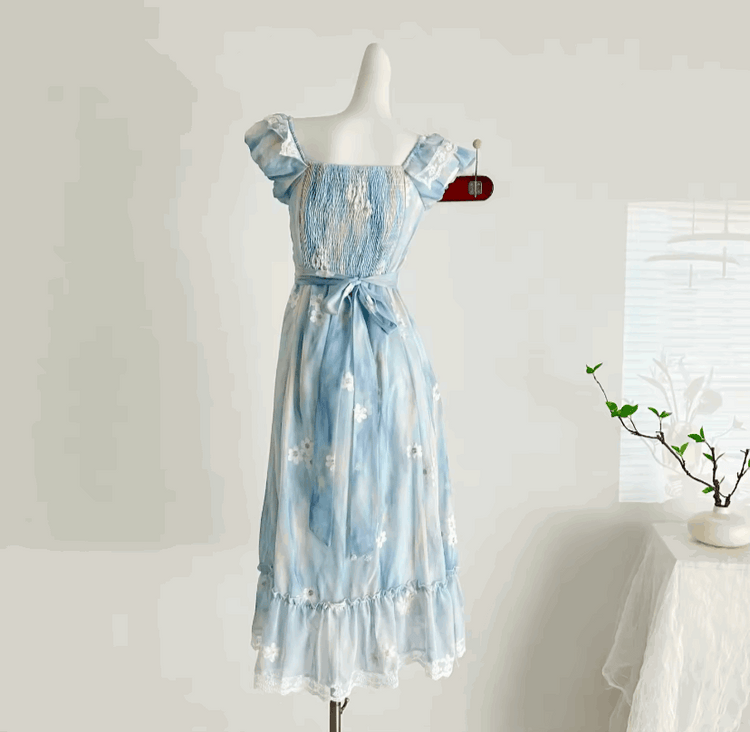 The back of the midi Ethereal Flower Princess Dress on a mannequin.