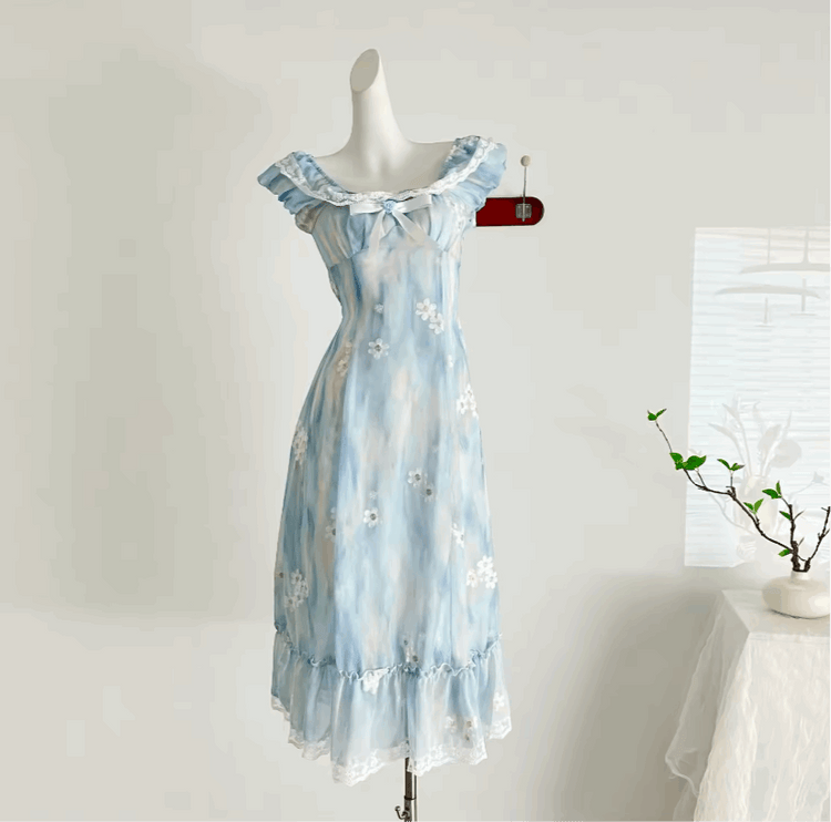 The front of the midi Ethereal Flower Princess Dress on a mannequin.