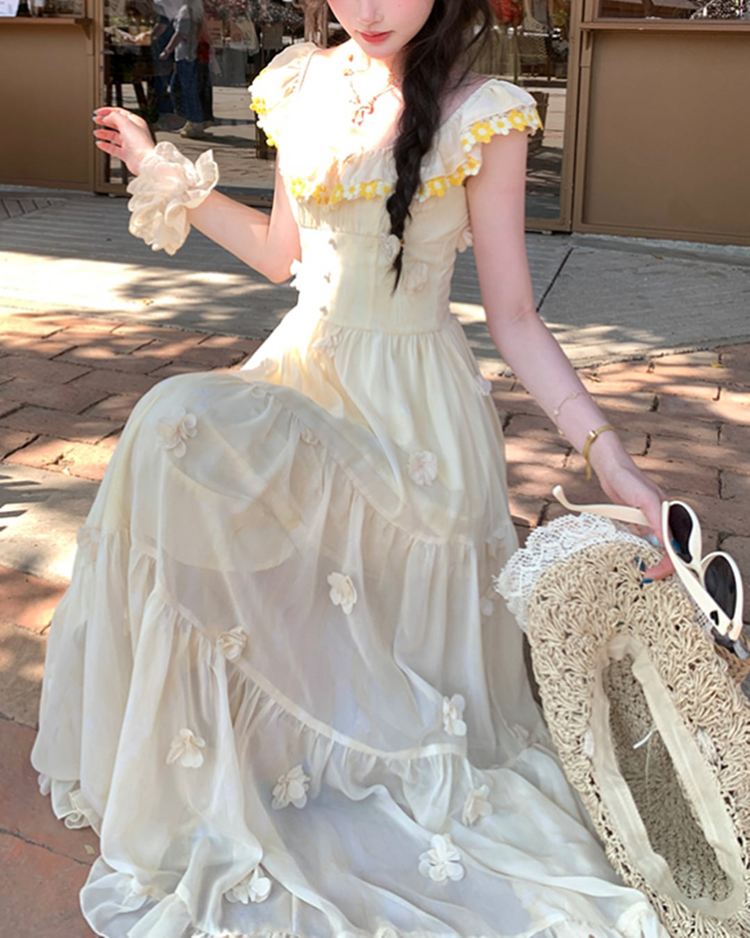 Model sitting in the Ethereal Flower Princess Heavenly Bloom Midi Dress in light yellow.
