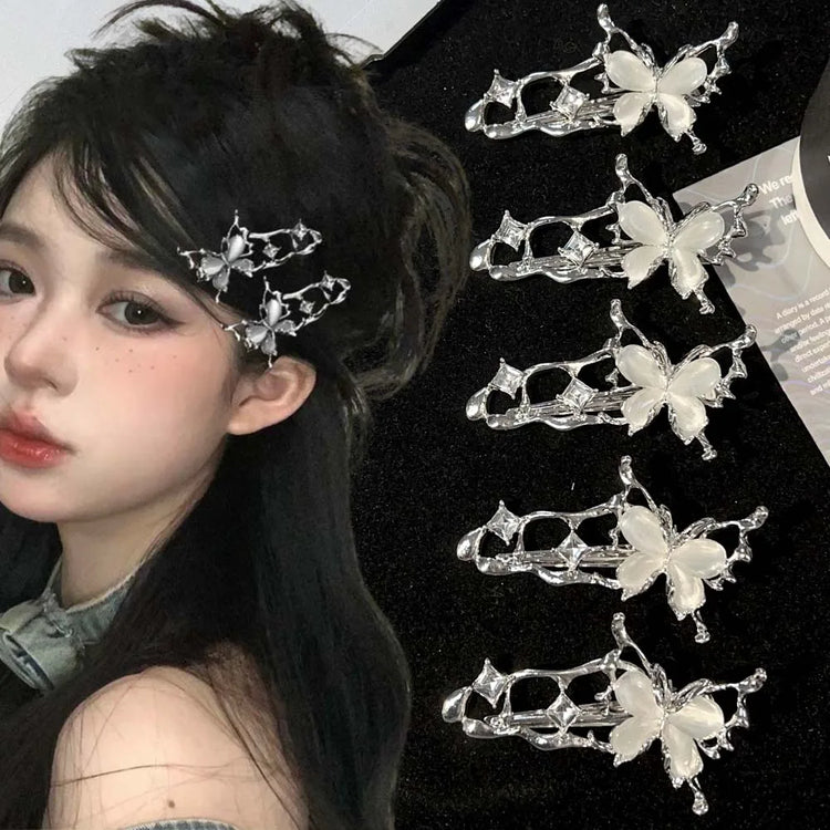 Model wearing the Liquid Metal Butterfly Hair Clip on dark hair, showcasing silver metallic butterflies along the side.