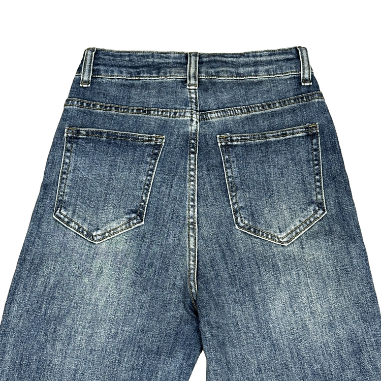 Back close-up view of the Main Mood Cloud-Stretch Flare Jeans in classic denim blue.