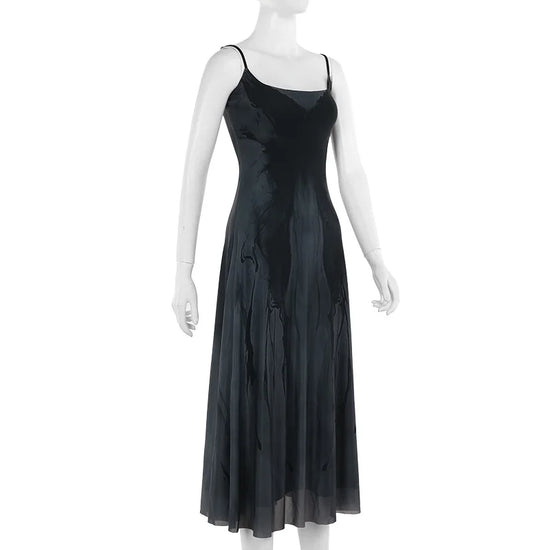 Angled front view of the Midnight Butterfly Maxi Dress on a mannequin to show natural drape.