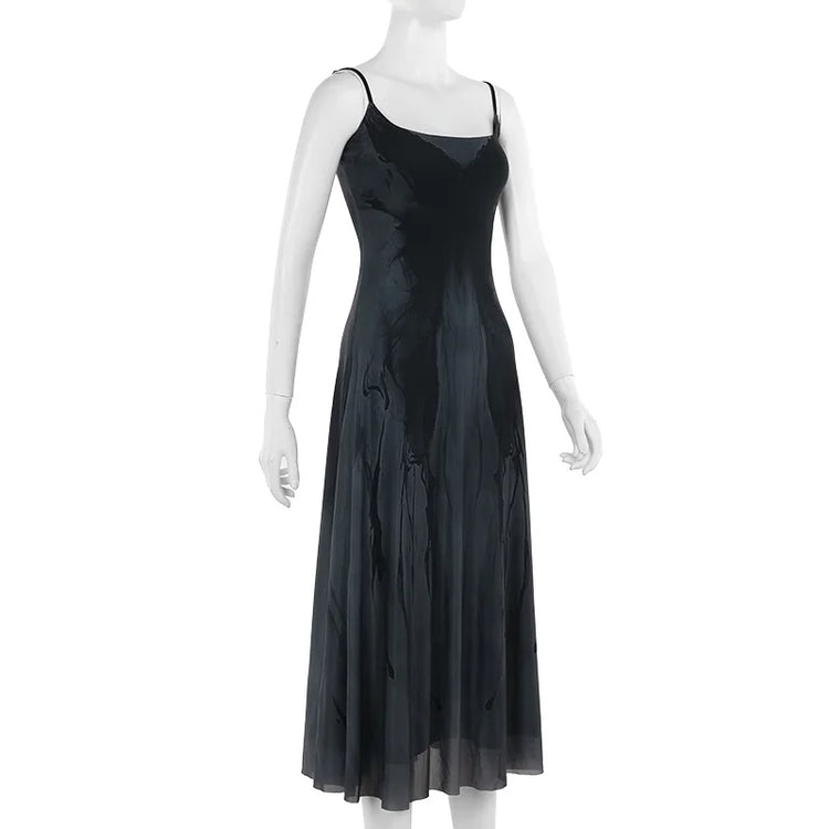 Angled front view of the Midnight Butterfly Maxi Dress on a mannequin to show natural drape.