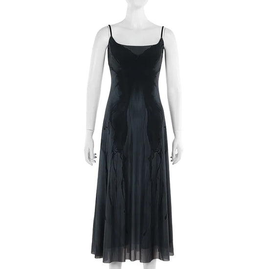 Midnight Butterfly Maxi Dress displayed on a mannequin from the front, showing flowy silhouette and butterfly print.