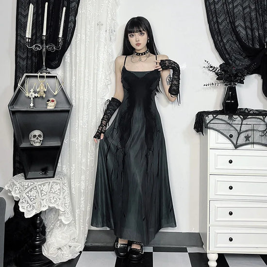 Model in the Midnight Butterfly Maxi Dress, with the skirt flaring out, showcasing the movement and layered silhouette.