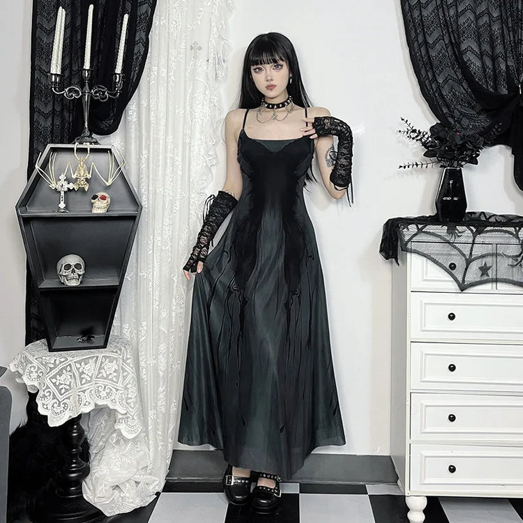 Model in the Midnight Butterfly Maxi Dress, with the skirt flaring out, showcasing the movement and layered silhouette.