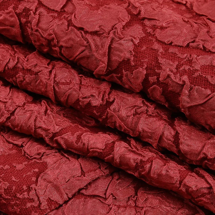 Detailed view of gothic floral baroque fabric of the red Midnight Masquerade High-Low Skirt