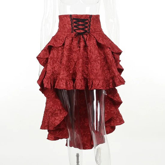 Red Midnight Masquerade High-Low Skirt shown on a clear mannequin highlighting lace-up front and texture
