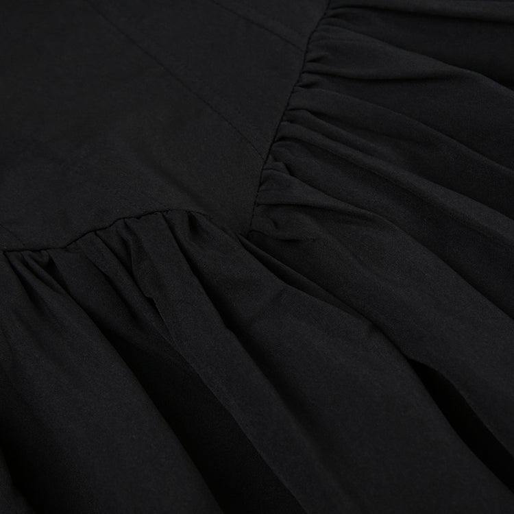Close-up of the corset-inspired paneling on the front of the Midnight Sonata Corset Dress.