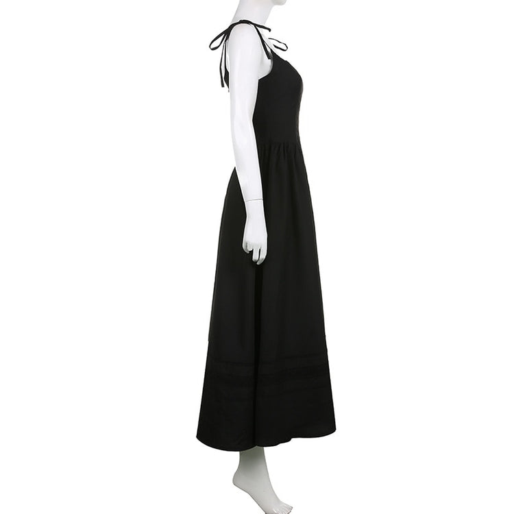 The Midnight Sonata Corset Dress on a white mannequin, showing the side of the dress, full length, and silhouette.