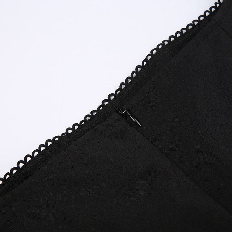Close-up of the zipper area of the Midnight Sonata Corset Dress.