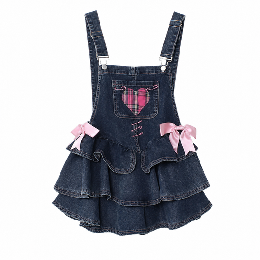 Pocket Full of Love Overall Dress in blue denim with pink plaid heart, bows, and tiered skirt