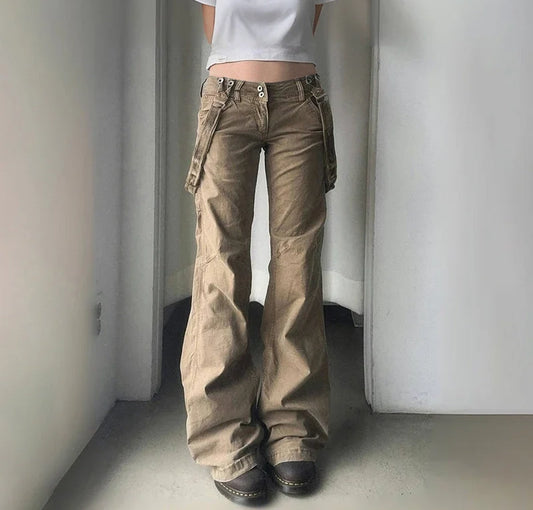 Front view of the Rogue Revival Utility Pants with strap accents and flared hem