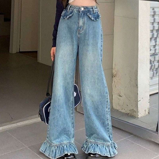 Model wearing Ruffle Flare Wide Leg Jeans, showing ruffle hems, high-waisted fit, and ruffle faux front pockets