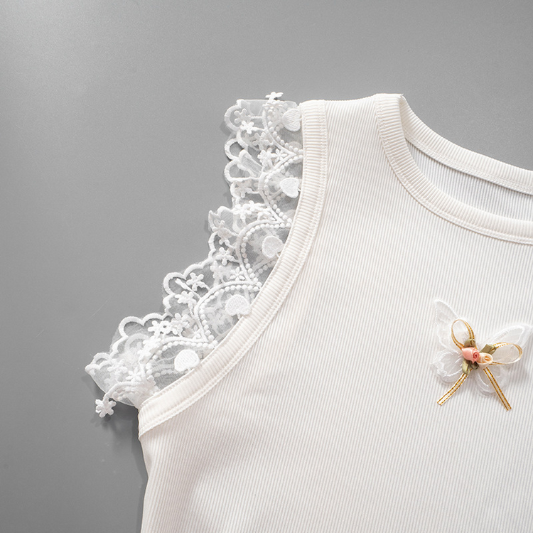 Lace shoulder detail with heart and flower accents on the Serene Butterfly Crop Top