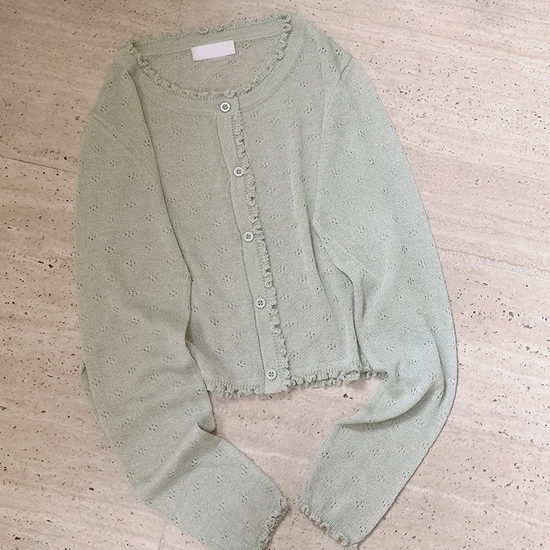 Green Sheer Sweetness Cardigan flat laid on floor