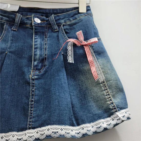 Side view of Southern Charm Mini Skort in deep blue showing pocket ribbon bows and soft flare shape