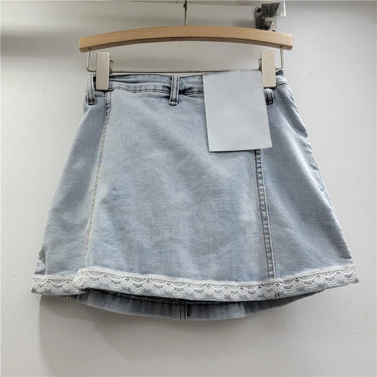 Back view of light wash Southern Charm Mini Skort showing lace hem and no back pockets