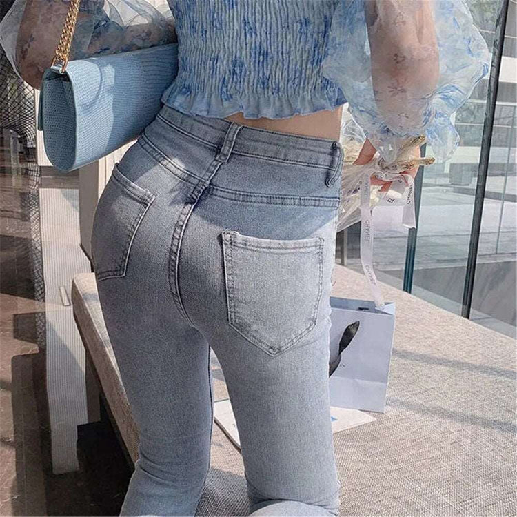 Model wearing Split Statement Pearl Jeans showing the back of the jeans from the knee upwards