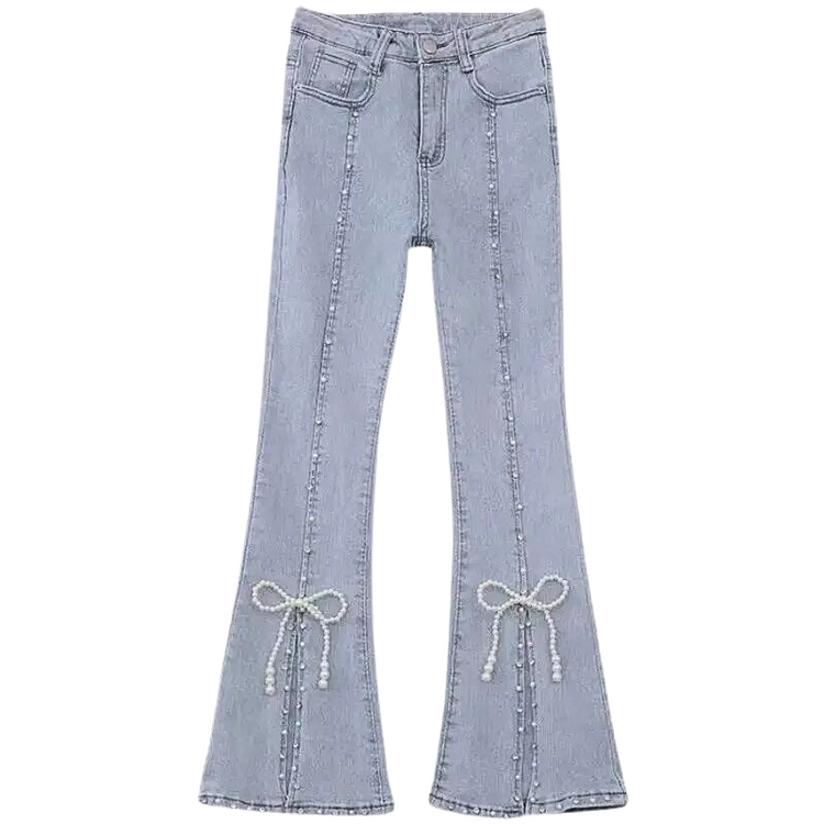 Flat lay of Split Statement Pearl Jeans with calf-high slits and pearl bow details