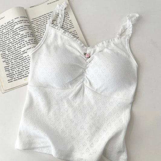 White Sweet Flower Crop Top laid flat on white background, lace-trimmed straps and ruched center visible.