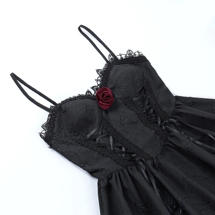 Flat lay close-up of the bodice on the Thorned Rose Corset Dress, showing the rose appliqué and lace trim.