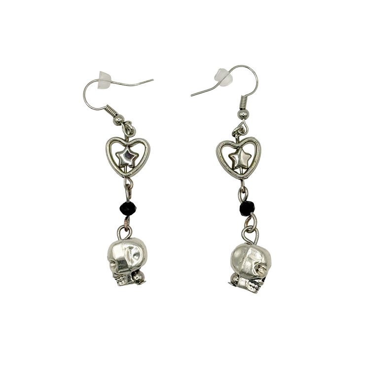 Til Death Do We Sparkle Earrings, black variant, shown from side angle highlighting silver skull and faceted black bead.