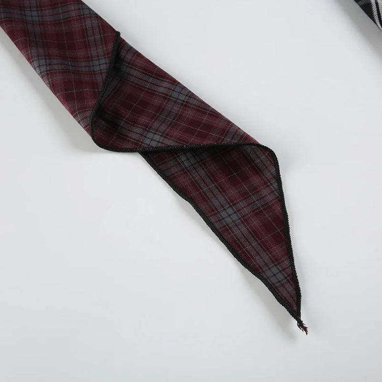 Detail shot of one of the long, cascading layers on the Tilted Temper Tartan Skirt