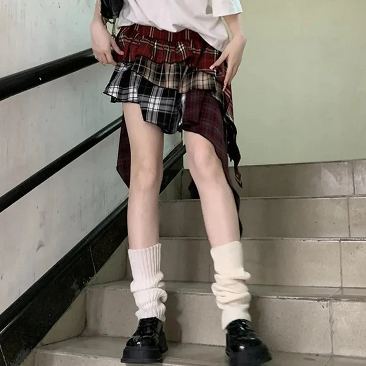 Tilted Temper Tartan Skirt styled with oversized tee and platform shoes
