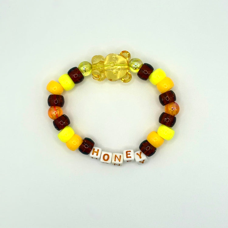 Two Moody Originals: Kandi Bracelet in Honey Bear – Charm Kandi