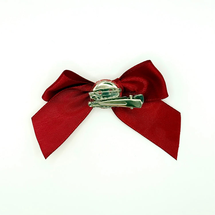 Back of the small classic Two Moody Originals: Signature Bow Clips in the color burgundy, showcasing the alligator hair clip and brooch pin
