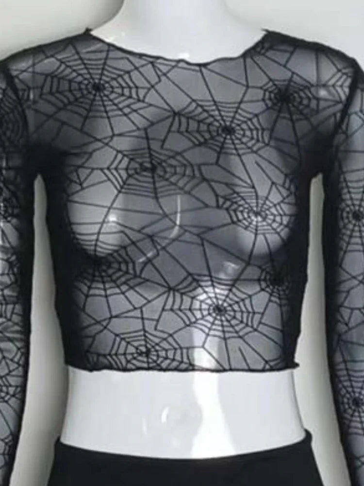 Close-up of the Web of Shadows Mesh Top, highlighting the sheer black spiderweb mesh pattern and fitted silhouette.