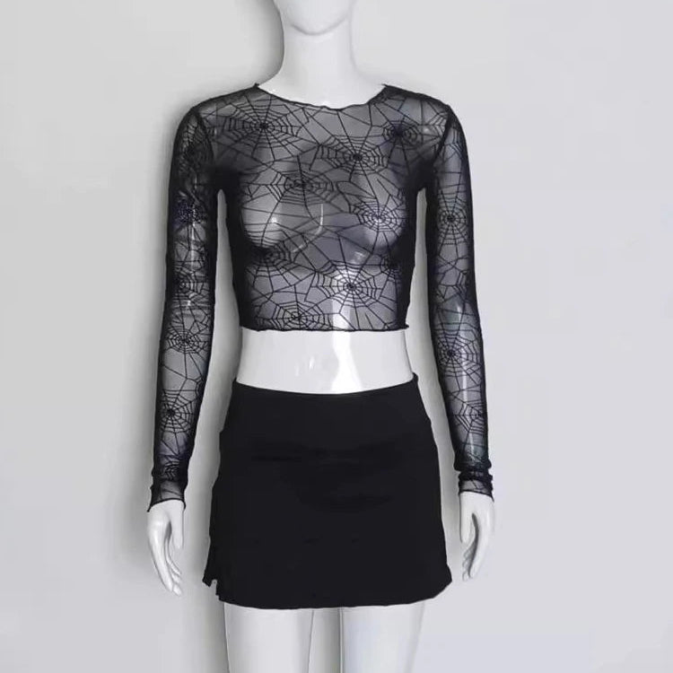Full front view of the Web of Shadows Mesh Top, displayed on a mannequin, highlighting the sheer spiderweb mesh and cropped slim fit.
