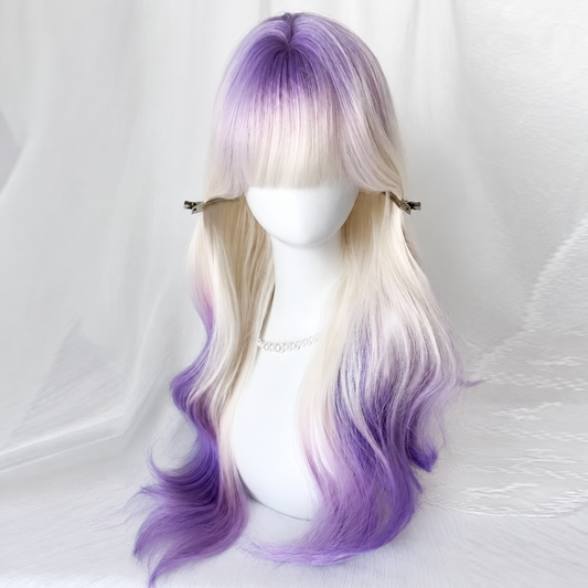 Front view of the Wisteria Waves Wig on a mannequin with lavender roots, pale bangs, and purple wavy ends.