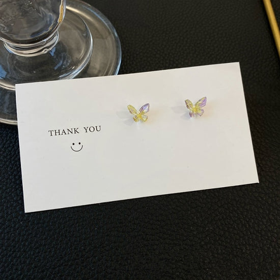 Dreamlit Butterfly Stud Earrings with a yellow green and purple color blend.