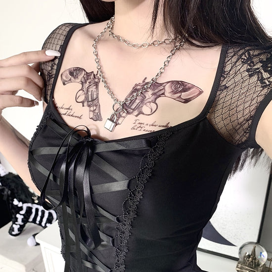 Slightly overhead view of model in Petal Noir Top
