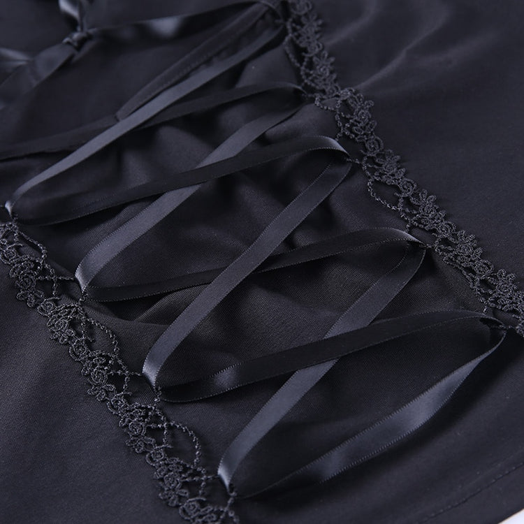 Detail shot of satin lace-up ribbon at the front of Petal Noir Lace-Up Top