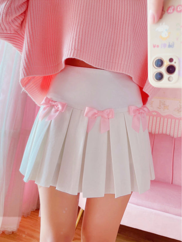 Close-up of pink ribbon bow detail on the Sweetheart Academy Skort