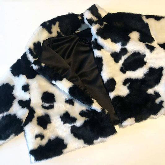 Flat Lay of Udderly Wild Faux Fur Jacket showing full print and relaxed fit with clasp open