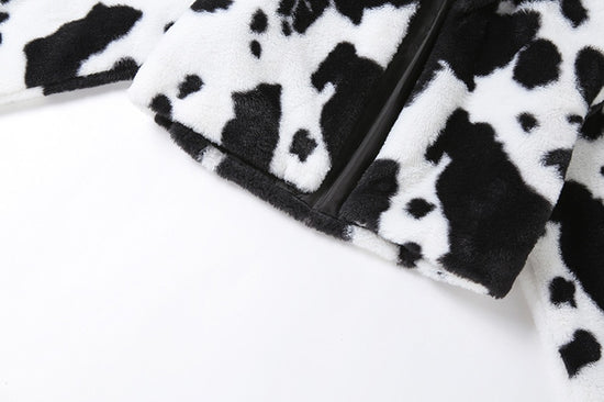 Close-up view of bottom half of flat lay on Udderly Wild Jacket