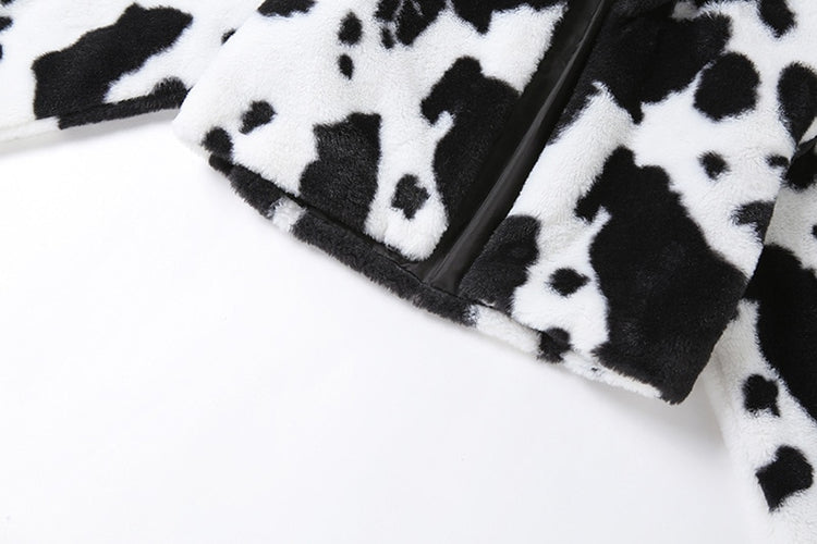 Close-up view of bottom half of flat lay on Udderly Wild Jacket