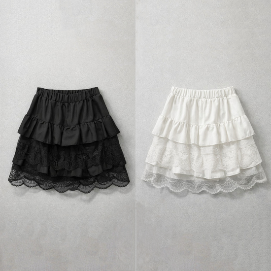Flat lay of the Frosted Layers Ruffle Skort in black and white.